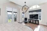 Step into luxury with this stunning bedroom, featuring a modern design and ample natural light.