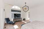 This stunning bedroom boasts a modern design with a touch of elegance.