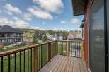 Enjoy stunning views from this beautiful property! This home features a spacious deck with a modern railing system, perfect for relaxing and entertaining.