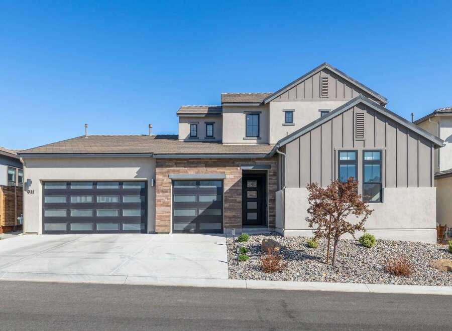 Discover modern luxury in this stunning home featuring a sleek design and contemporary finishes.