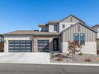 Discover modern luxury in this stunning home featuring a sleek design and contemporary finishes.