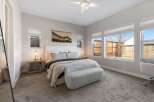 Step into this inviting bedroom, featuring a serene ambiance and modern design.