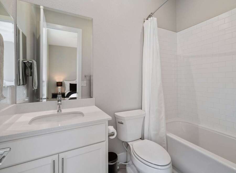 This stunning bathroom features a modern design with clean lines and a bright, airy feel.