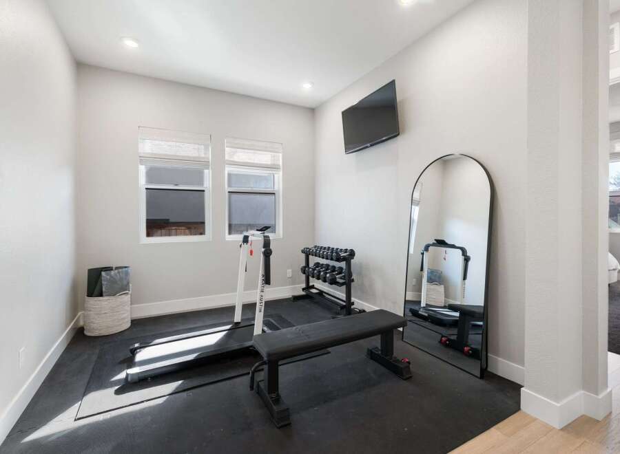 This home gym offers a dedicated space for fitness enthusiasts.
