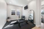 This home gym offers a dedicated space for fitness enthusiasts.