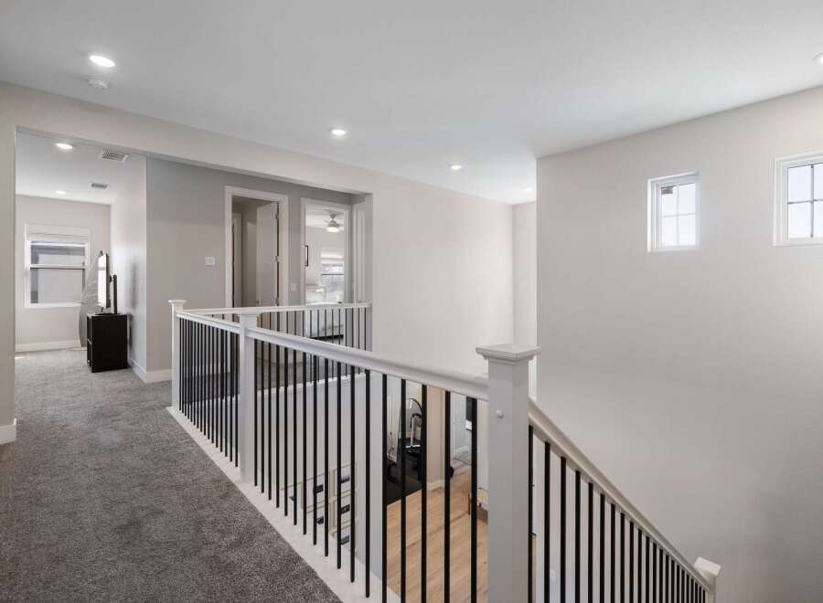 This stunning property boasts a bright and airy hallway, perfect for welcoming guests.