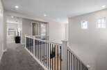 This stunning property boasts a bright and airy hallway, perfect for welcoming guests.
