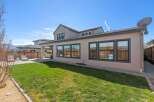 Enjoy the beauty of this stunning home with a spacious backyard, perfect for outdoor gatherings and relaxation.