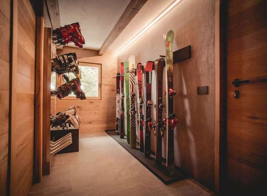 This stunning property boasts a dedicated ski storage area, perfect for winter enthusiasts.