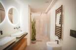 Step into modern luxury with this stunning bathroom design.