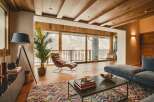 Experience luxury living in this stunning property, featuring a spacious living area with a modern design.