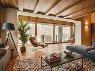 Experience luxury living in this stunning property, featuring a spacious living area with a modern design.