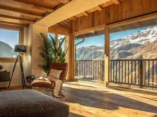 Experience breathtaking mountain views from this stunning property.