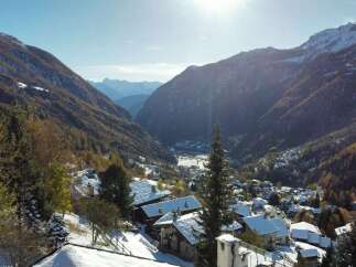 Nestled in a picturesque mountain valley, this stunning property offers breathtaking views and a serene atmosphere.
