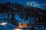 Escape to your dream mountain retreat! This stunning property boasts a cozy, inviting atmosphere with breathtaking views of the snow-capped peaks.