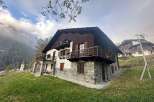 Discover the charm of this stunning chalet nestled in a picturesque mountain setting.