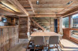 Experience rustic elegance in this stunning chalet-style dining room.