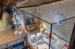 Experience luxury living in this stunning property, featuring a cozy living area with a plush sofa and stylish decor.