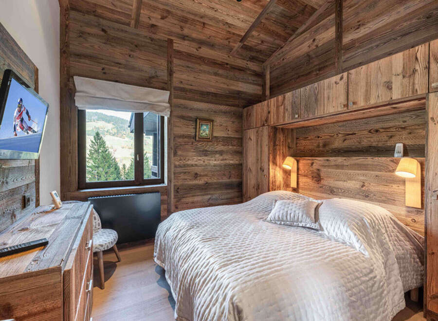 Experience rustic elegance in this stunning bedroom.