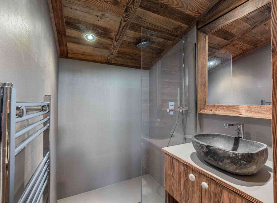Experience rustic elegance in this stunning bathroom.