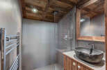Experience rustic elegance in this stunning bathroom.