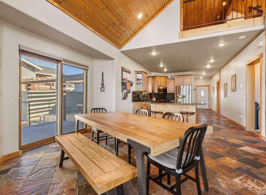 This stunning property boasts a spacious dining area, perfect for hosting gatherings.