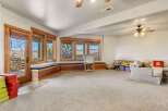 This spacious living area offers a bright and inviting atmosphere, perfect for relaxation and entertainment.