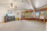 This spacious room offers a versatile space for various activities.