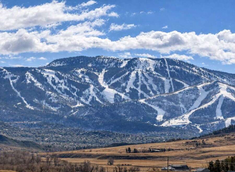 Experience breathtaking mountain views from this stunning property.