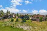 Discover this stunning multi-home property nestled against a picturesque mountain backdrop.