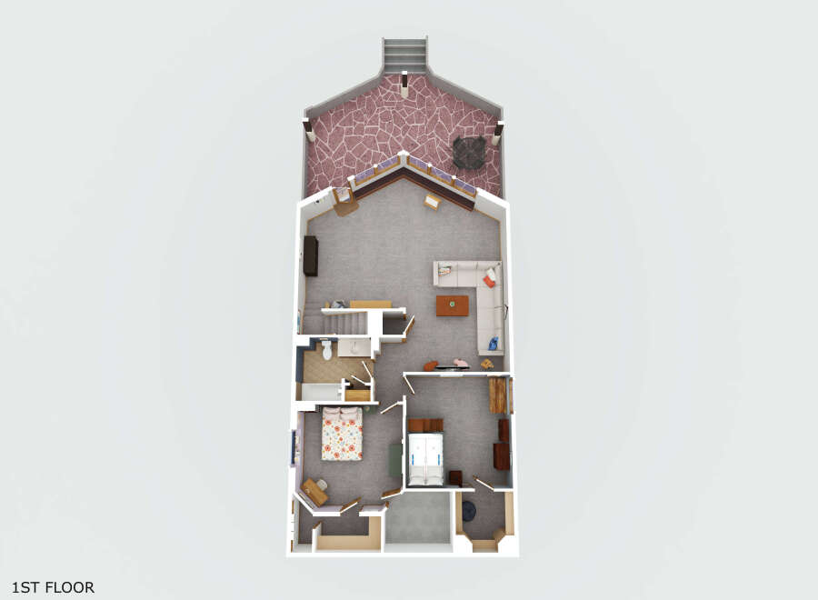 Discover this charming 1st-floor layout featuring a spacious living area with a sectional sofa and coffee table, perfect for gatherings.