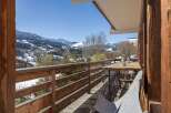 Enjoy breathtaking mountain views from this stunning balcony.