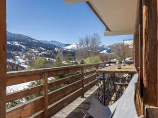 Enjoy breathtaking mountain views from this stunning balcony.