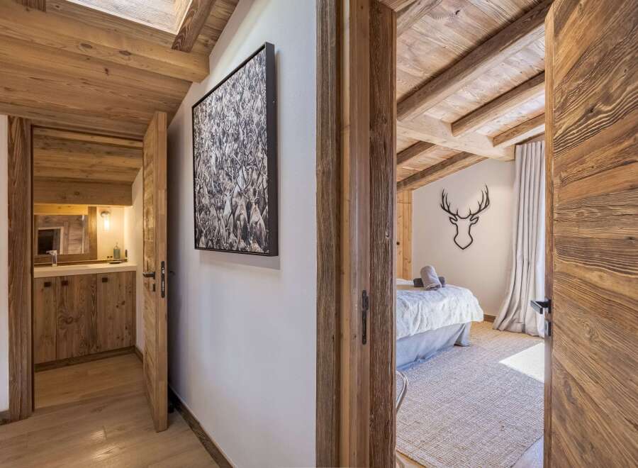 Step into luxury with this stunning property, showcasing exquisite wooden accents and a warm, inviting atmosphere.