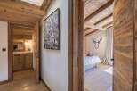 Step into luxury with this stunning property, showcasing exquisite wooden accents and a warm, inviting atmosphere.
