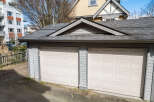 This charming property features a detached two-car garage, perfect for storing vehicles or providing extra space.