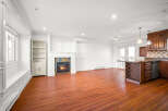 This stunning property boasts a spacious interior with a cozy fireplace, perfect for relaxing evenings.