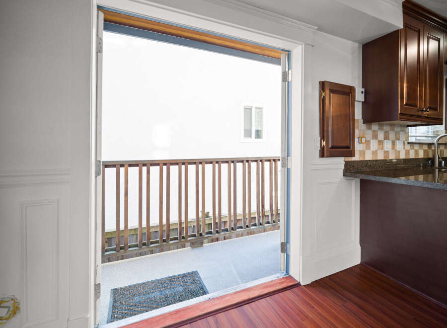 Step into this inviting kitchen with a seamless transition to the outdoors.