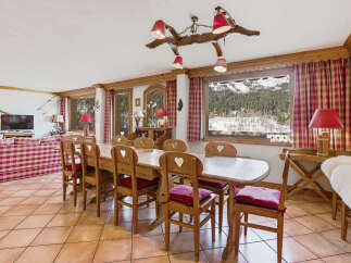Experience the charm of this stunning property, featuring a spacious dining area perfect for gatherings.