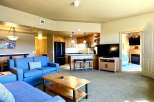 Step into luxury with this stunning property, featuring a spacious living area perfect for relaxation and entertainment.