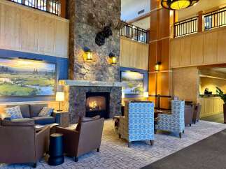 Step into the inviting lobby of this stunning property, where rustic charm meets modern elegance.