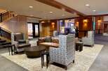 Step into luxury and comfort in this stunning hotel lobby.