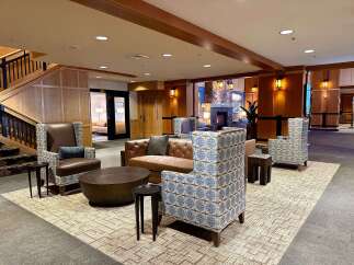 Step into luxury and comfort in this stunning hotel lobby.
