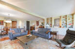 Step into luxury with this stunning living room, featuring two elegant sofas and a stylish marble coffee table.