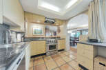 Step into a beautifully designed kitchen, perfect for culinary enthusiasts and hosting guests.