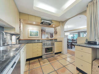 Step into a beautifully designed kitchen, perfect for culinary enthusiasts and hosting guests.