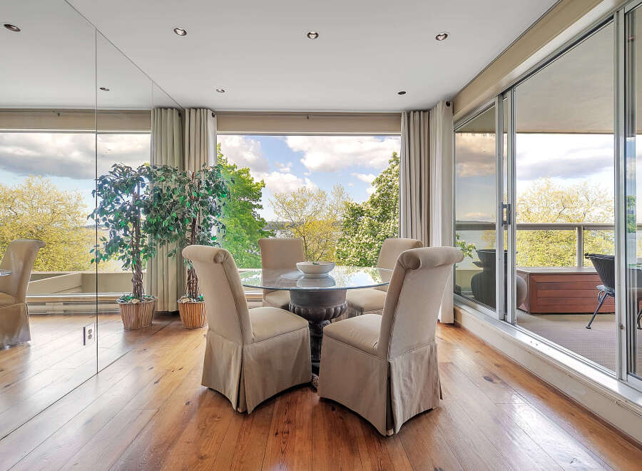 This stunning dining area offers breathtaking views and a seamless connection to the outdoors.