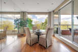 This stunning dining area offers breathtaking views and a seamless connection to the outdoors.