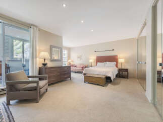 Step into luxury with this stunning bedroom! Featuring a spacious layout, this room offers ample space for relaxation and comfort.