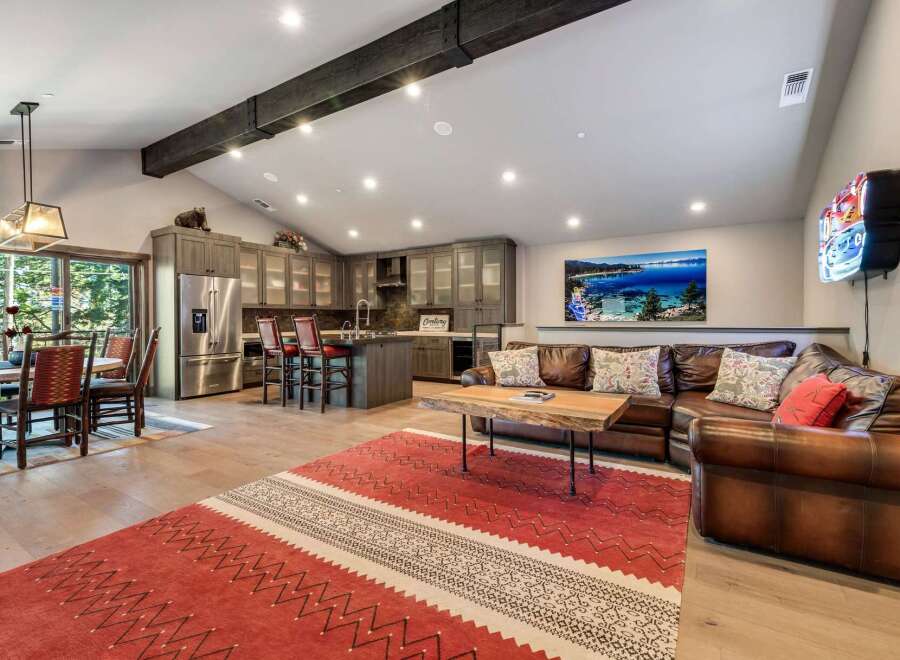 Step into luxury with this stunning property, featuring a spacious open-concept living area.